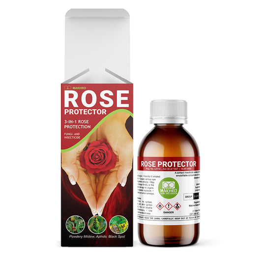 A bottle of Makhro Rose Protector placed next to its packaging box. The bottle is labeled with product information and the box features a rose illustration with the text 'ROSE PROTECTOR 3-in-1 ROSE PROTECTION'.