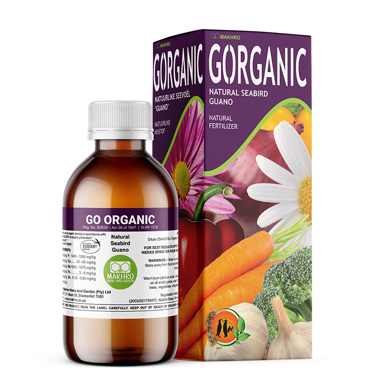 A container of Go Organic natural seabird guano fertilizer, with a label featuring images of plants and vegetables.