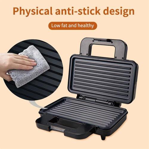 Black grill with anti-stick surface and text highlighting features on a beige background