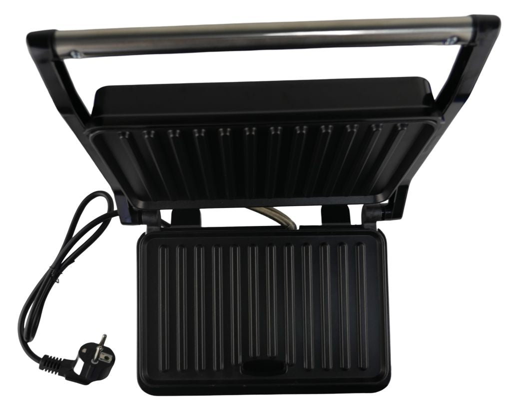 Black grill with power cord on a white background