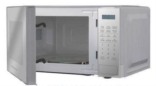 Silver microwave oven on a white background