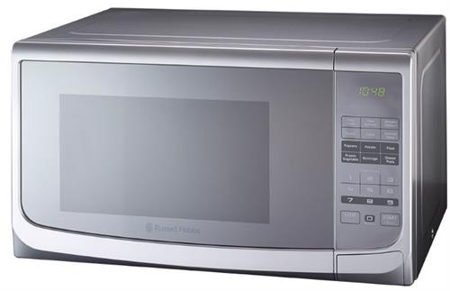 Stainless steel microwave oven on a white background