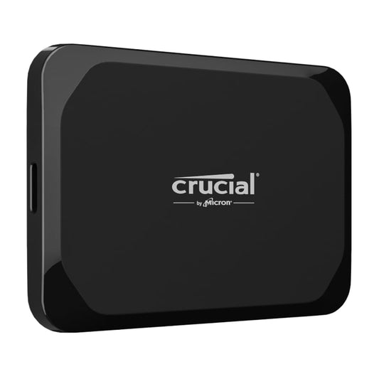 A black Crucial X9 Type-C Portable SSD with the brand logo visible on the top.