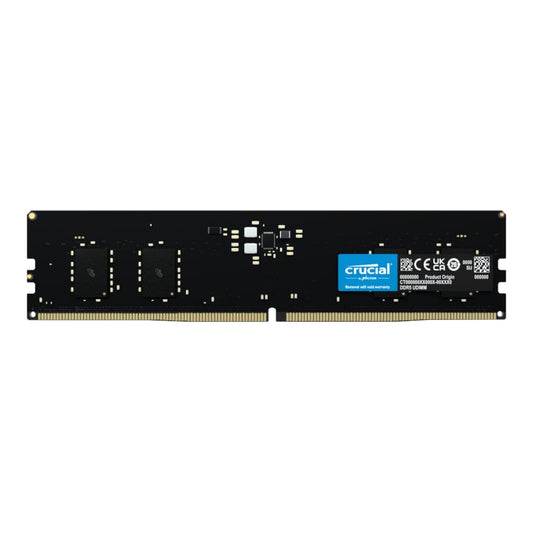 A Crucial by Micron DDR5 desktop memory module with a row of silver-colored contact points on one side.