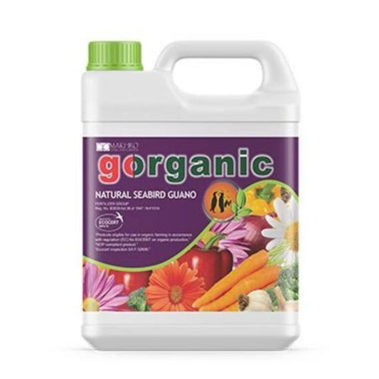A container of Go Organic natural seabird guano fertilizer, with a label featuring images of plants and vegetables.