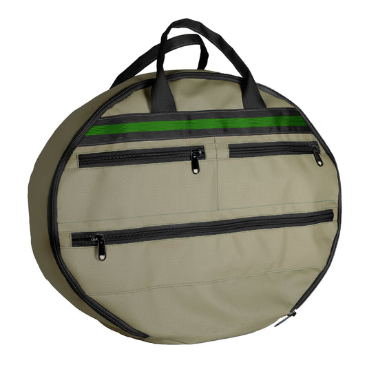 A green and black Kaufmann X AFRI Canvas Gas Braai Cover with handles.