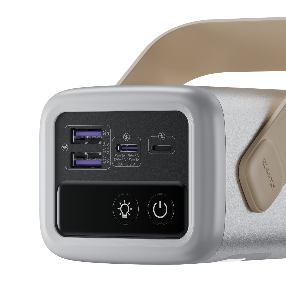 Close-up of a power bank with USB ports and control buttons on a white background