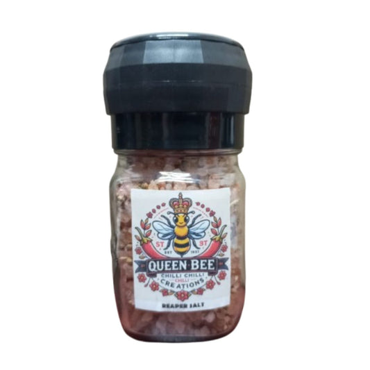 Jar of 'Queen Bee Chilli Chilli Creations' reaper salt with a bee logo on a white background.