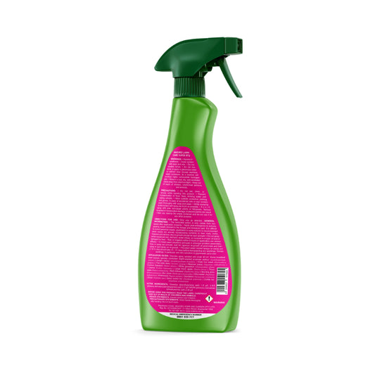 Green spray bottle with pink label on a white background