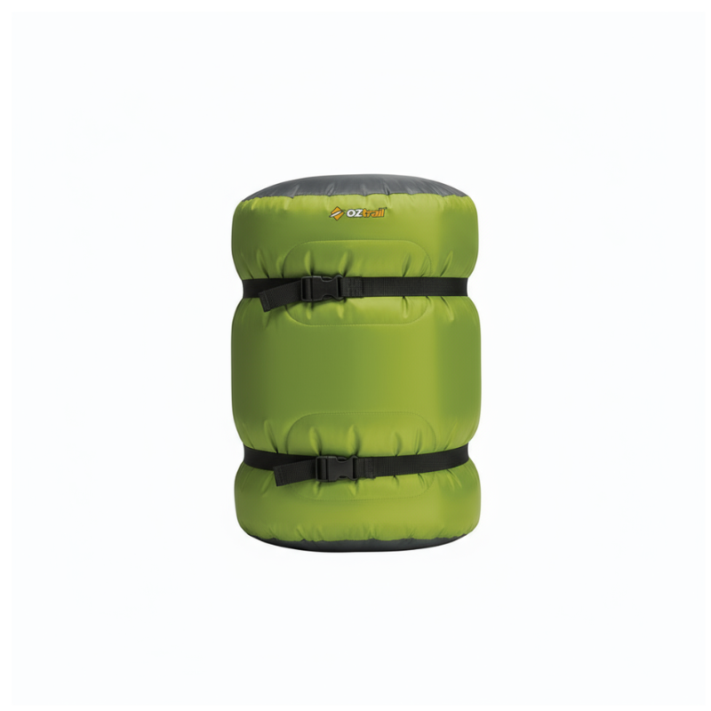 Green sleeping bag with black straps on a white background