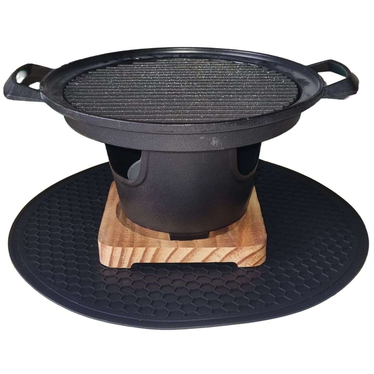 A black silicone mat designed for use with a Tafelbraai grill, displayed with the grill set on top.