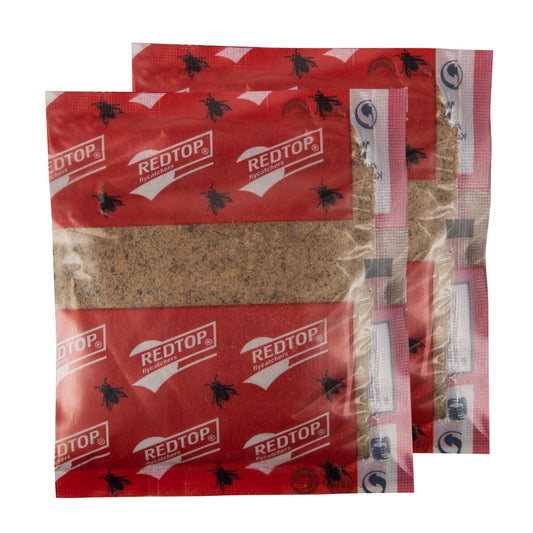 Two packages of Redtop Cup Trap Bait, each in a clear plastic bag with a red and white label featuring the brand name and product details.