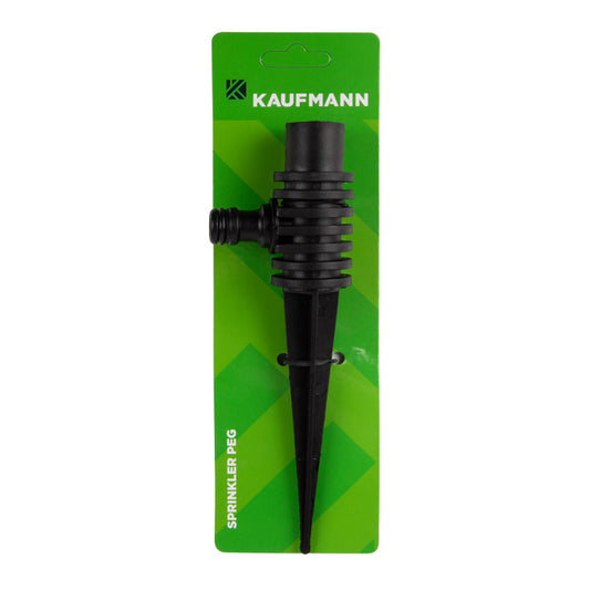 A black plastic sprinkler peg with a coupling device, mounted on a green blister pack with the Kaufmann brand logo.