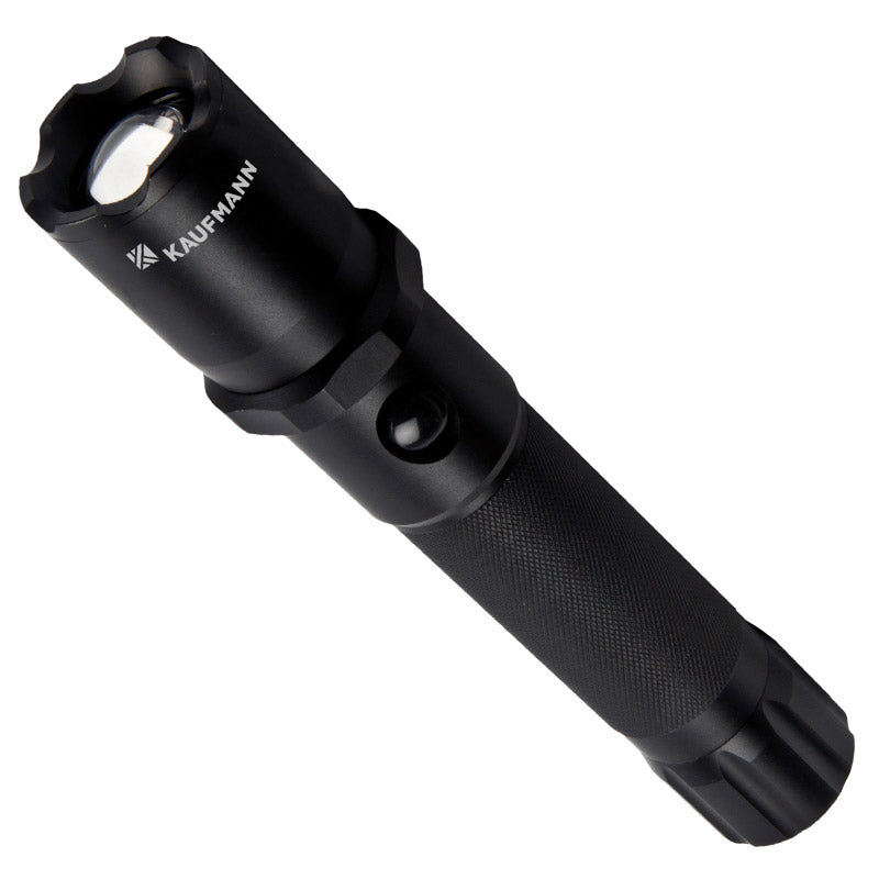 A black Kaufmann T650 LED flashlight with an adjustable focus feature, designed for outdoor use and emergencies.