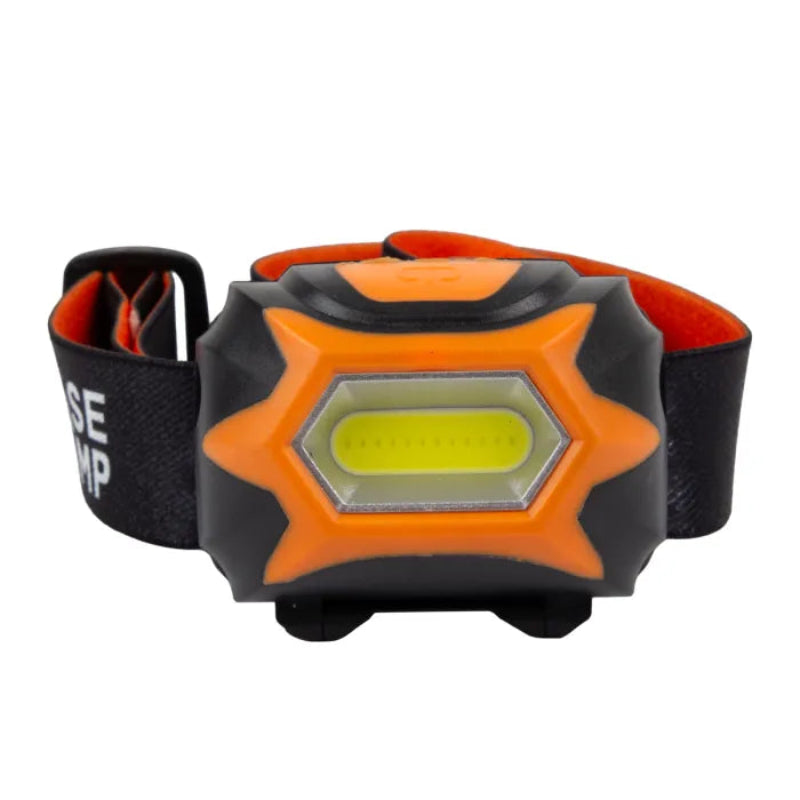 Orange and black headlamp on a white background