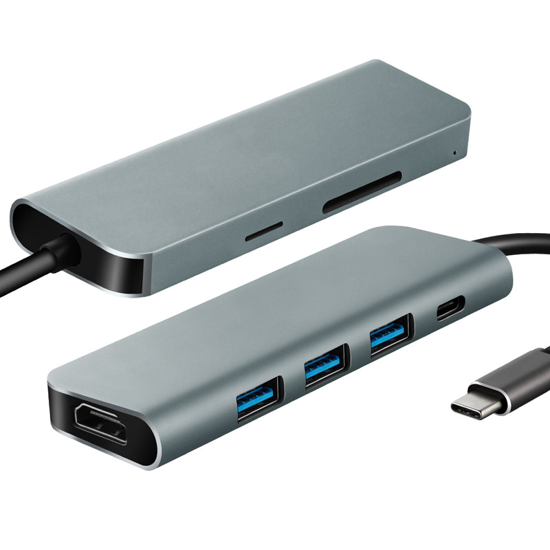 A gray Parrot 7-in-1 USB Type-C Hub with multiple ports, including USB-A and HDMI, with a connected cable.
