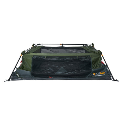 Green and black camping tent with OZtrail branding on a white background