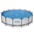 Round above-ground pool with blue water and metal frame, featuring Bestway branding.