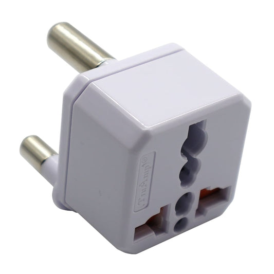 White travel adapter on a white background