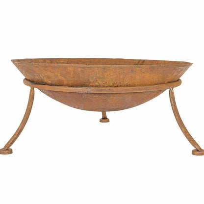 Rust-colored metal fire pit with decorative legs on a white background