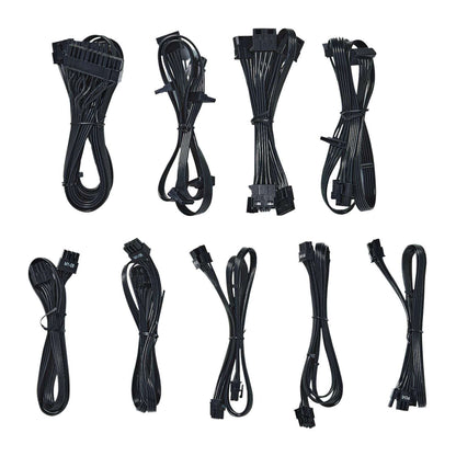 Set of black computer cables on a white background