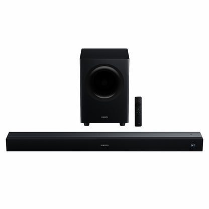 Black soundbar with subwoofer and remote on a white background