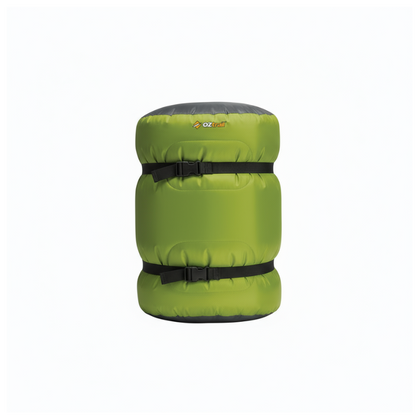 Green sleeping bag with black straps on a white background