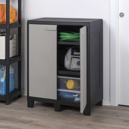 Storage cabinet with open door showing organized shelves against a white wall.