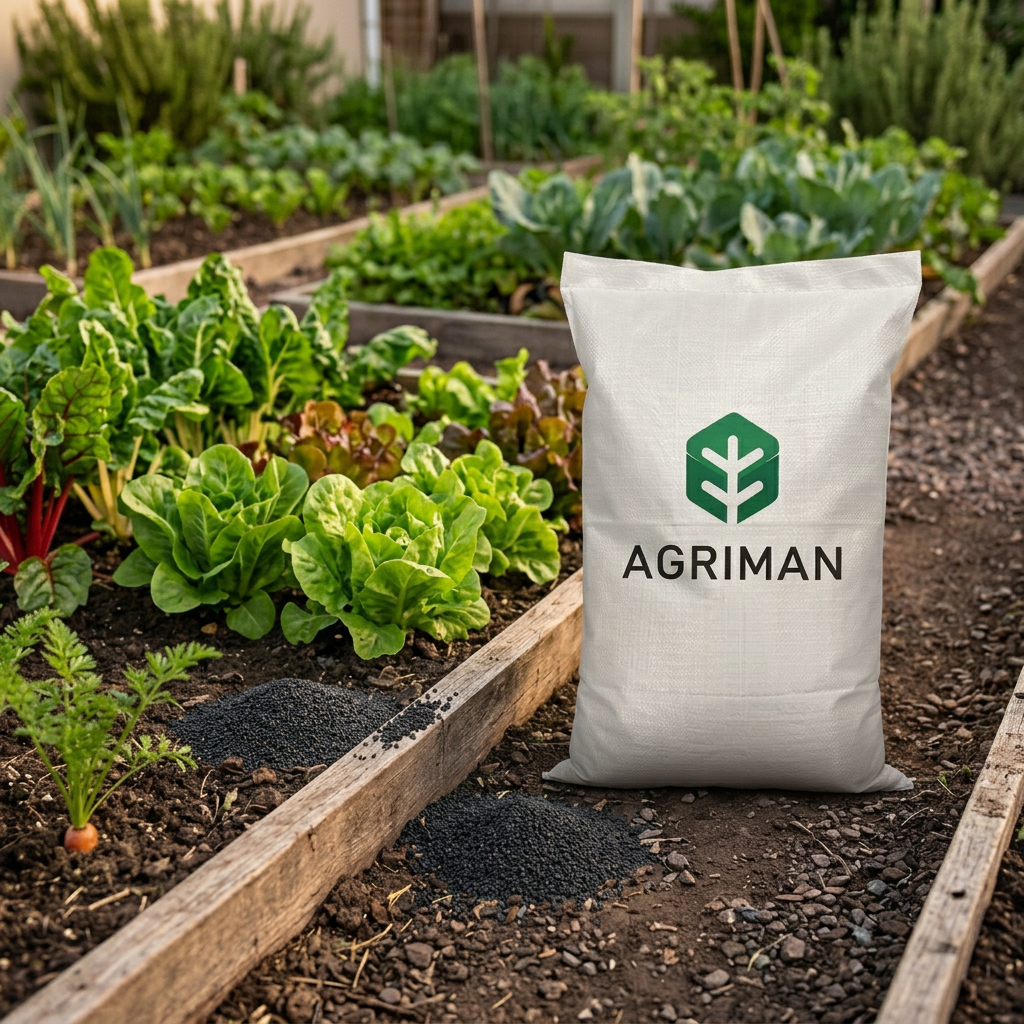 A white bag of Agriman  organic granular fertiliser stands in a garden next to raised wooden beds containing green lettuce and other vegetables.