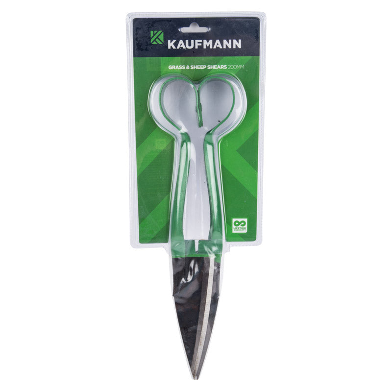 A pair of Kaufmann grass and sheep shears with a green and white color scheme, packaged for retail sale.