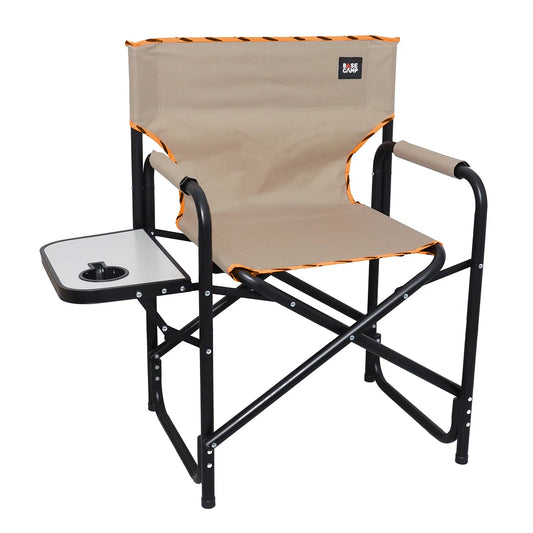 Beige camping chair with black frame and tray on a white background