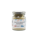 A jar of Fox & Jackal Garlic & Rosemary Seasoning, with a label that includes the product name and a brief description.